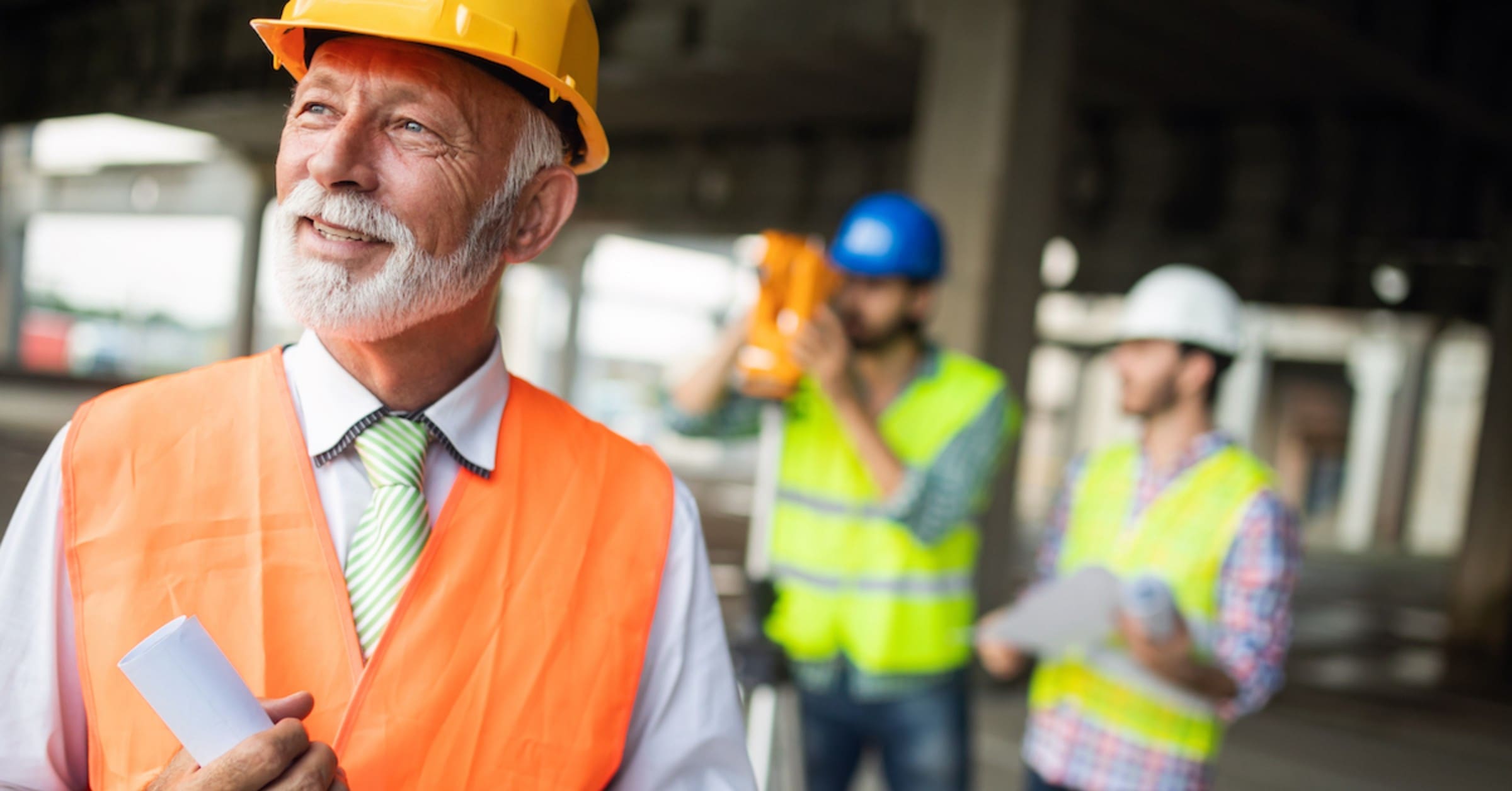 construction workers planning a building